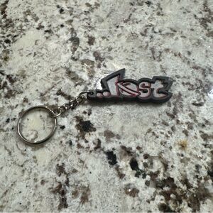 Vintage Lost Surfing Keychain